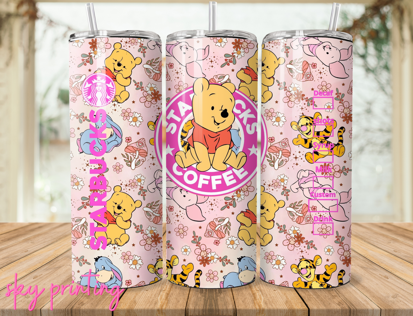 20 oz steel tumbler with plastic straw with winnie the pooh starbucks image