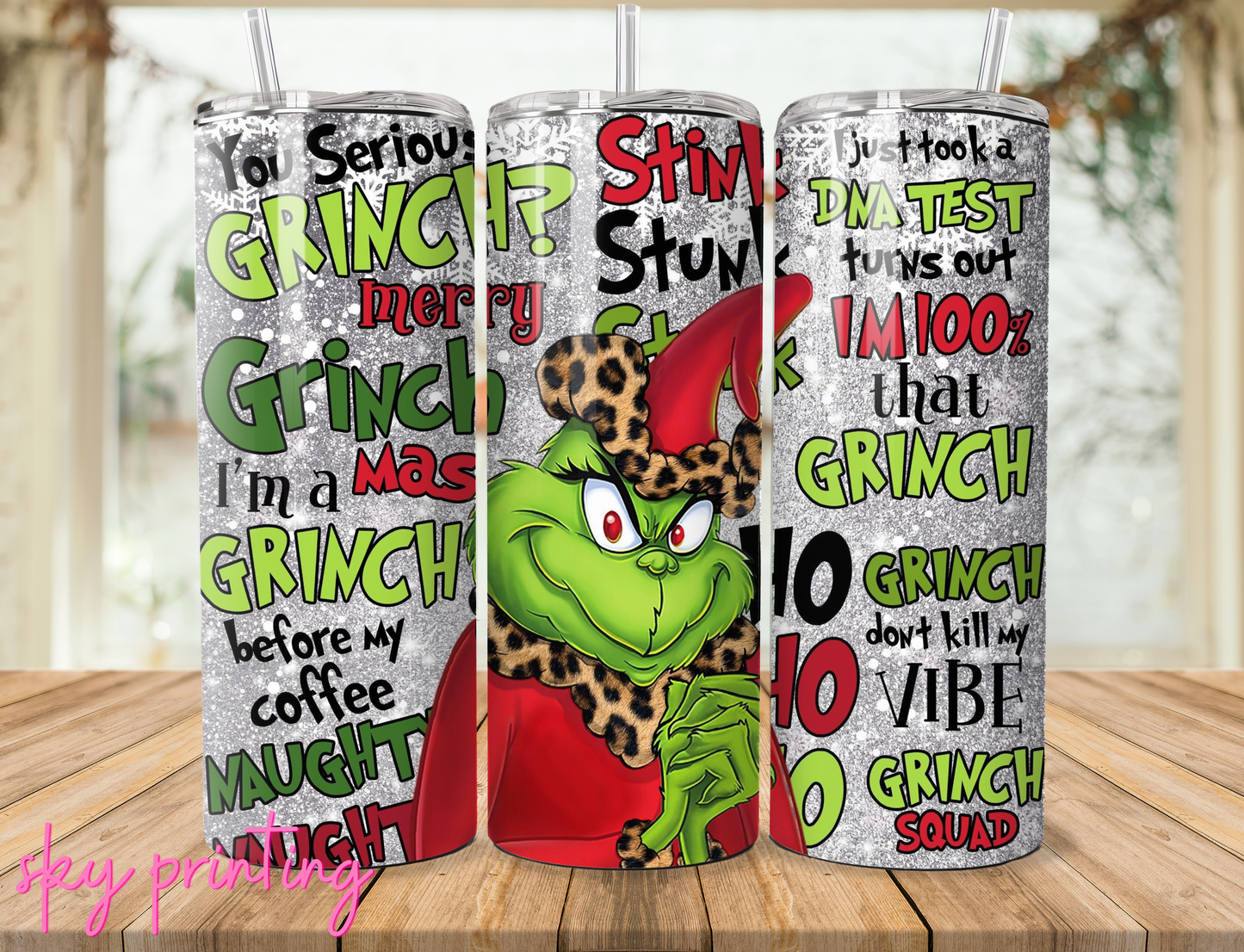 20 oz steel tumbler with plastic straw with the grinch image